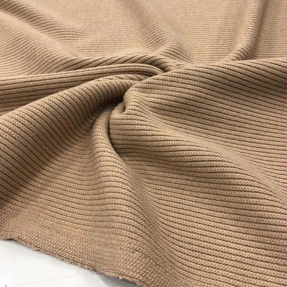 Dekorasyonda Triko Kumaş: Konfor ve Estetiğin Modern Buluşması