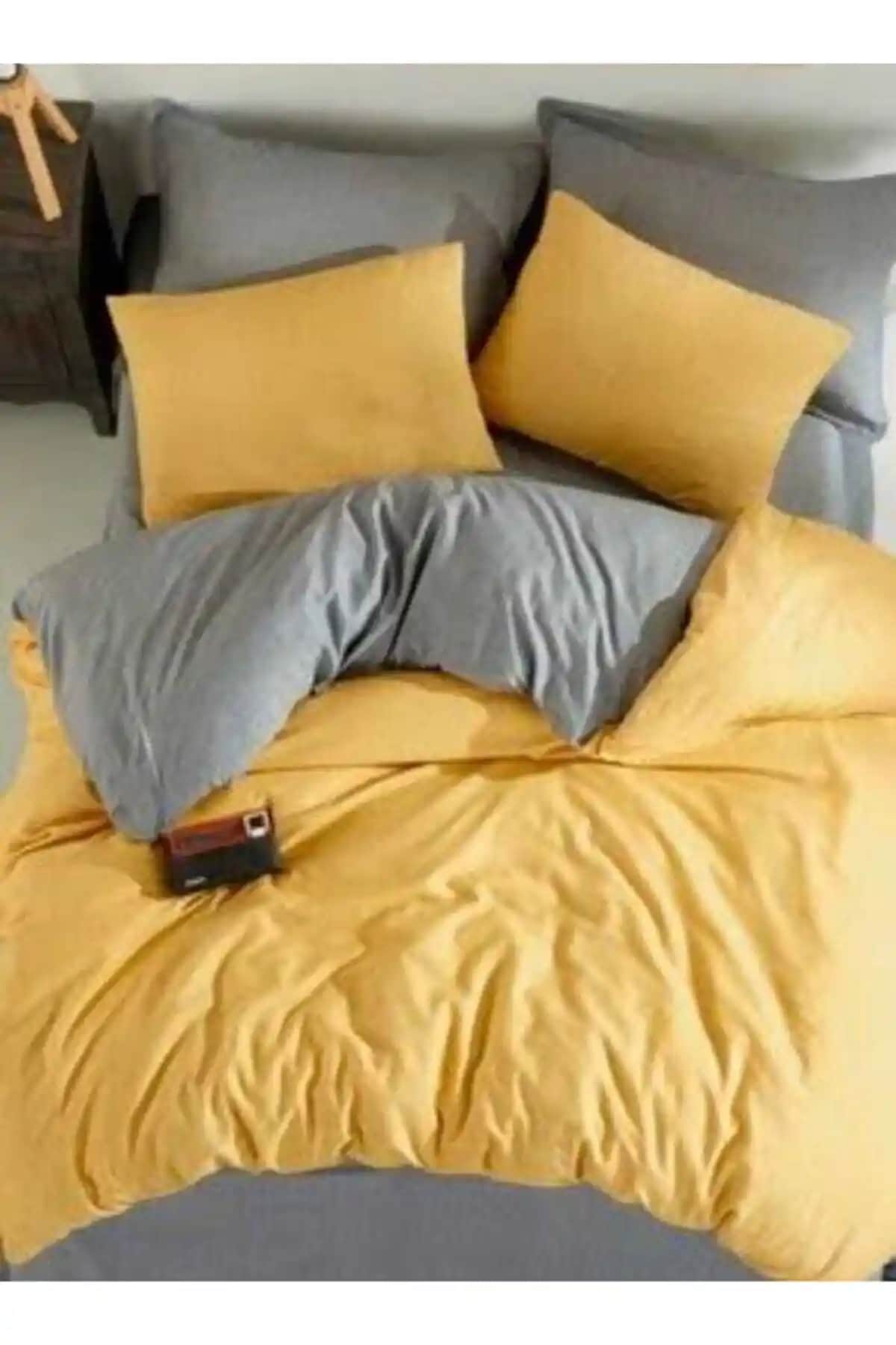 Modern ve Şık Sarı-Gri Nevresim Takımıyla Yatak Odanızı Yenileyin