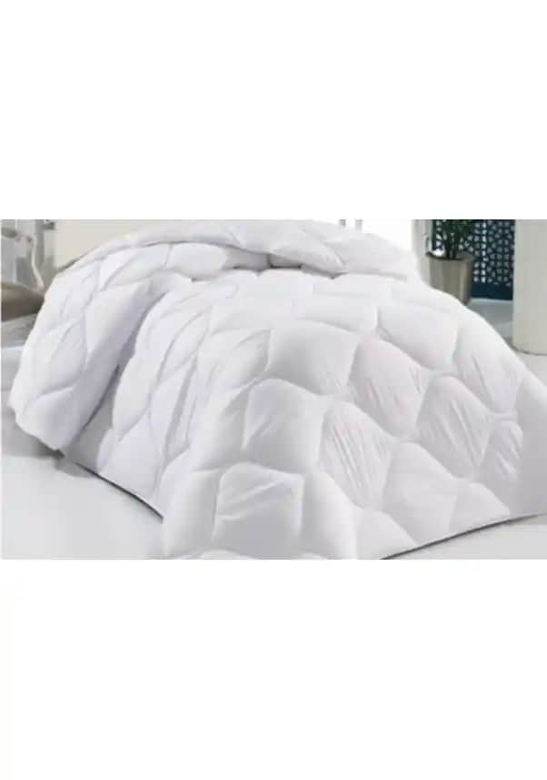 Tek Kişilik Pamuklu Yorgan: Konfor ve Estetiği Bir Arada Sunan Yatak Oyu Dekorasyonu