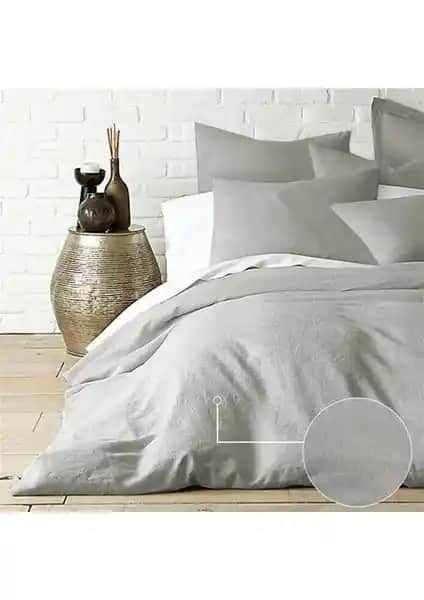 Caqqa Gri ve Valezium Antrasıt-Gri Tek Kişilik Nevresim Takımı Karşılaştırması