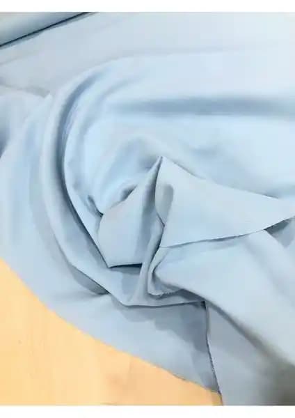 Vivola Moda'nın Mavi Likralı Gabardin Kumaşının Modern Tasarımlardaki Kullanım Alanları ve Özellikleri