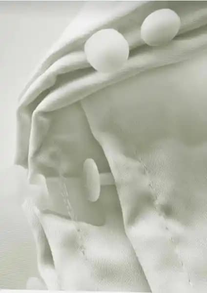 Taç Saten Güneşlik Perde: Estetik ve Dayanıklı İç Mekan Dekorasyonu İçin Ideal Seçenek