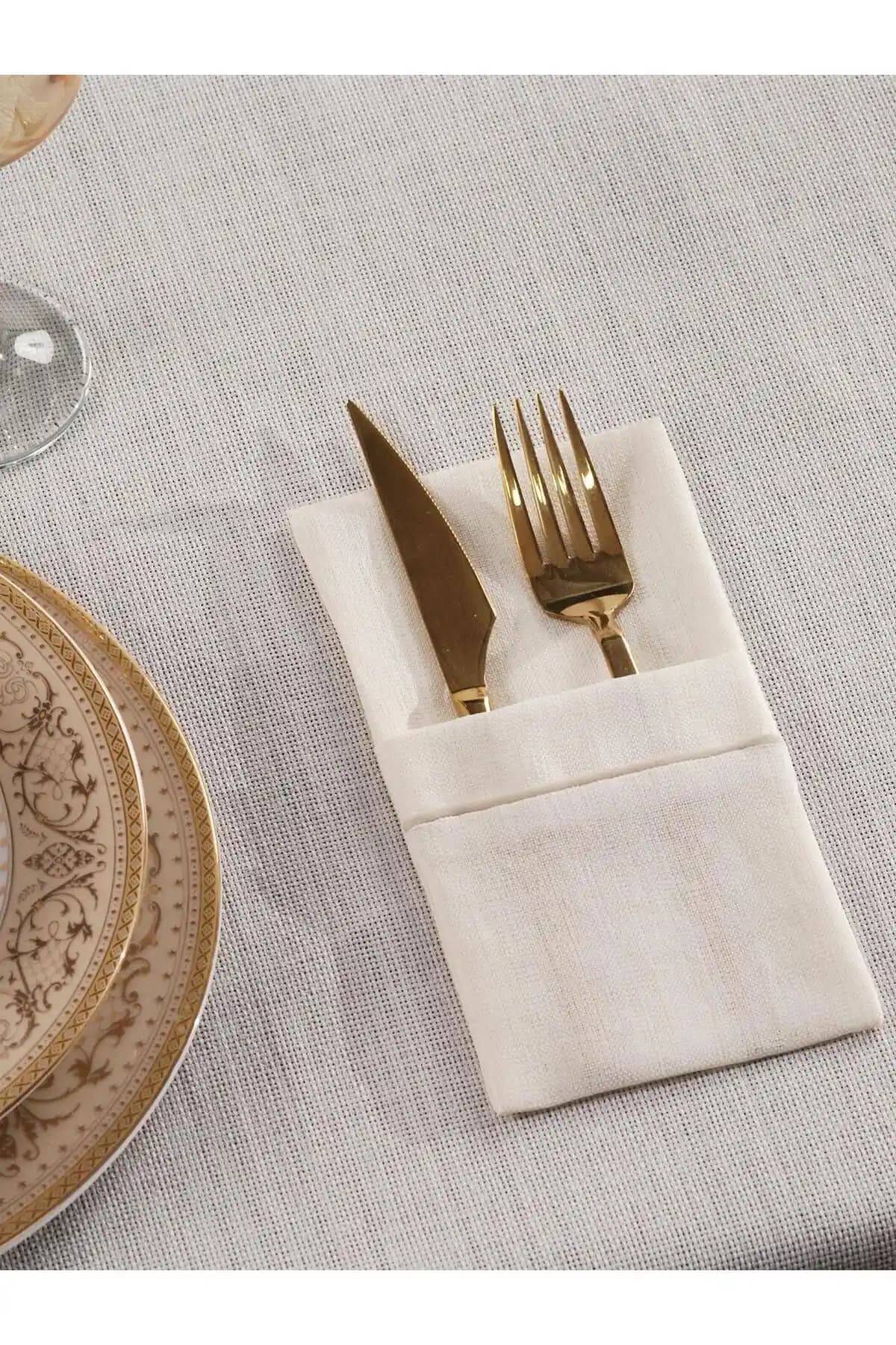 Kumaş Çatal Bıçak Kılıfı: Estetik ve Fonksiyonellik Sunan Modern Masa Dekorasyon Çözümü